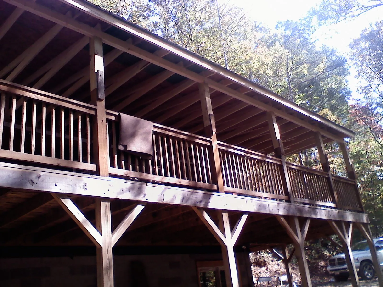Timber framing under a new elevated porch and deck — Roof Leak Repair in Guide Rock by Roofing Brothers